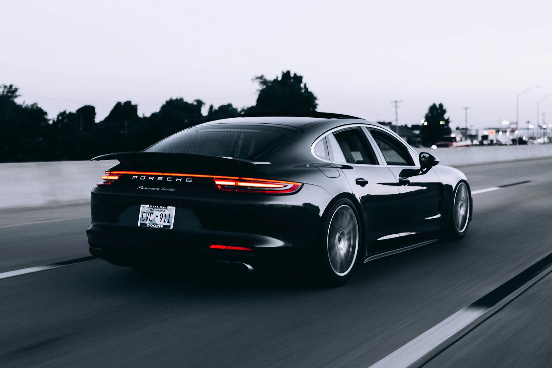 A premium car driving on an open road